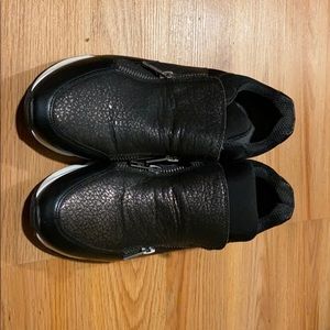 Women’s black leather sneakers